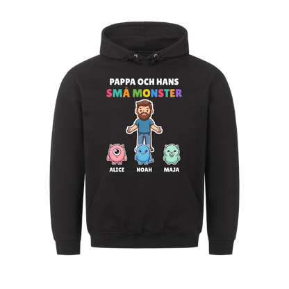Pappa och hans små monster hoodie med pappas figur, barnens monster och namn. Present till pappa