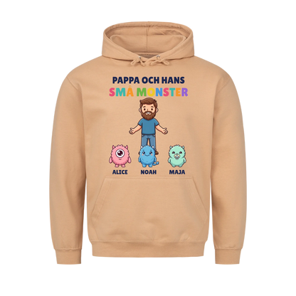 Pappa och hans små monster hoodie med pappas figur, barnens monster och namn. Present till pappa